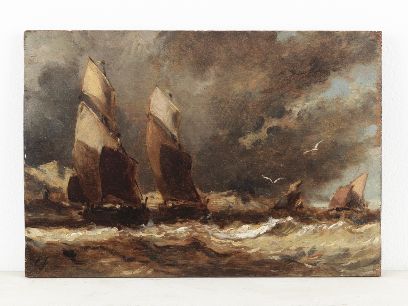 Painting depicting two boats on sea with colors in browns and hues of gold.