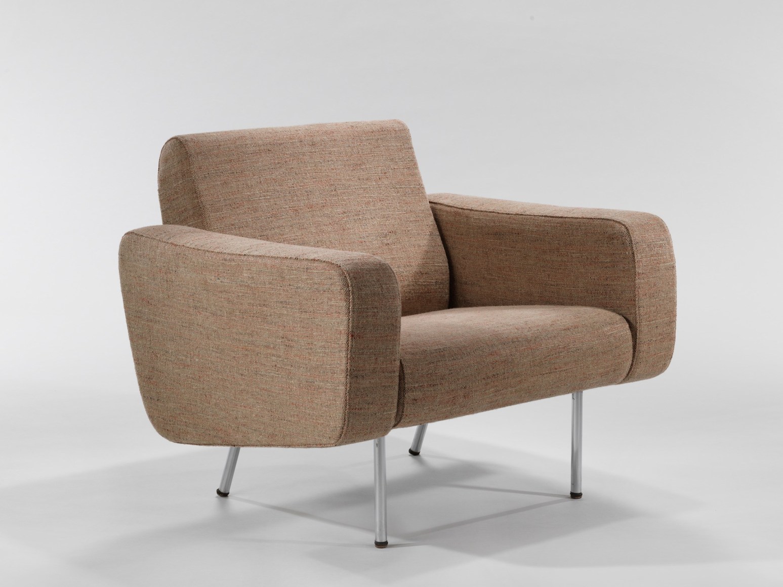 beige chair in a blank room