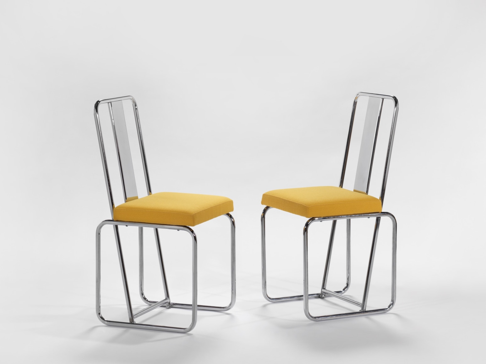 yellow chairs in an empty room