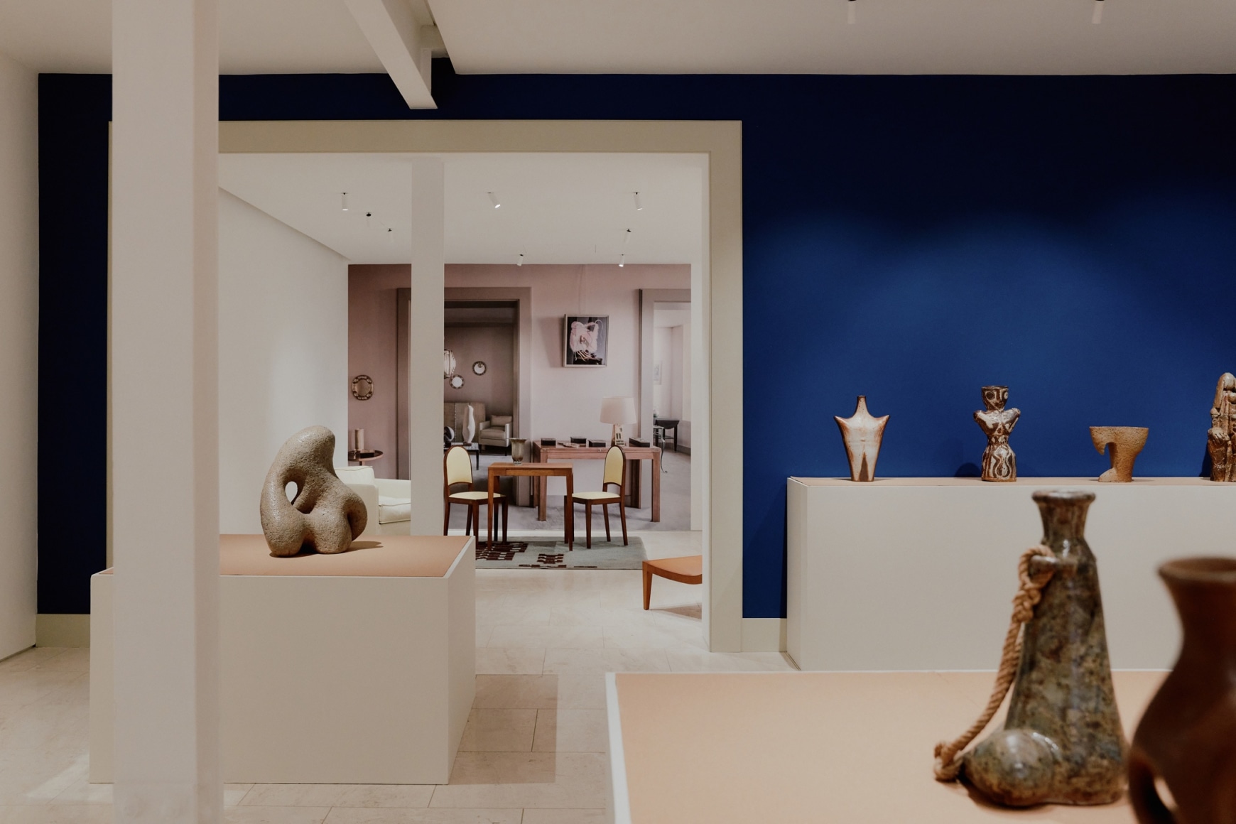 photograph of furniture in a room at a gallery exhibition