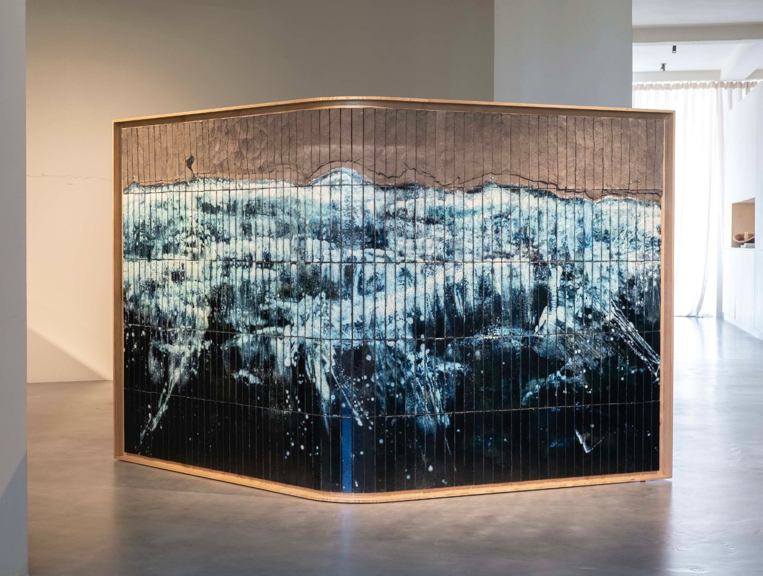 photo of a blue painted panel in a room