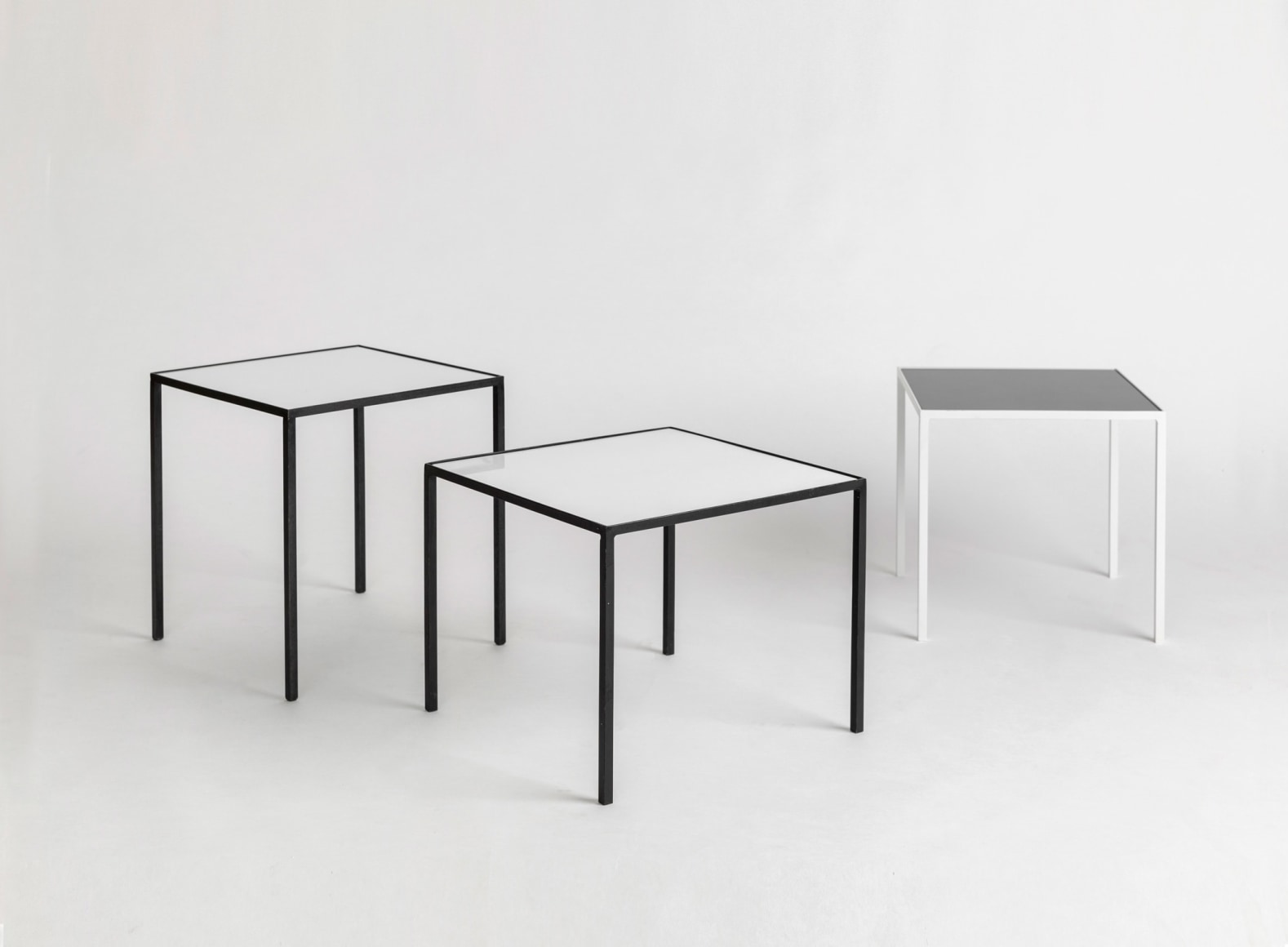 3 black and white side tables