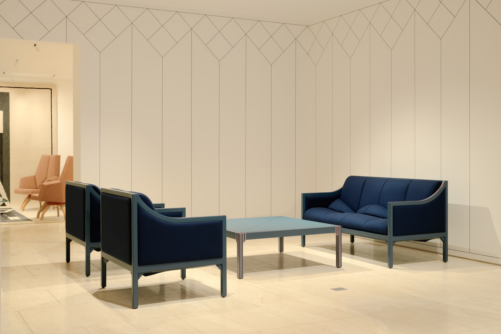 Installation view inside the gallery of works by Pierre Paulin. Multiple in the frame of shot. Many different colors such as blues and reds.