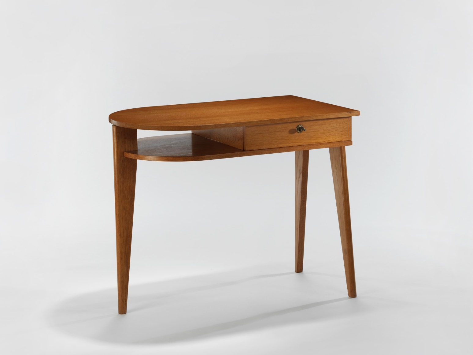 wood desk in an empty room