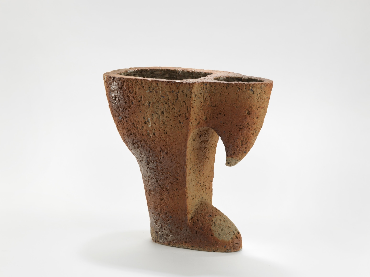 photograph of a ceramic dish in an empty room