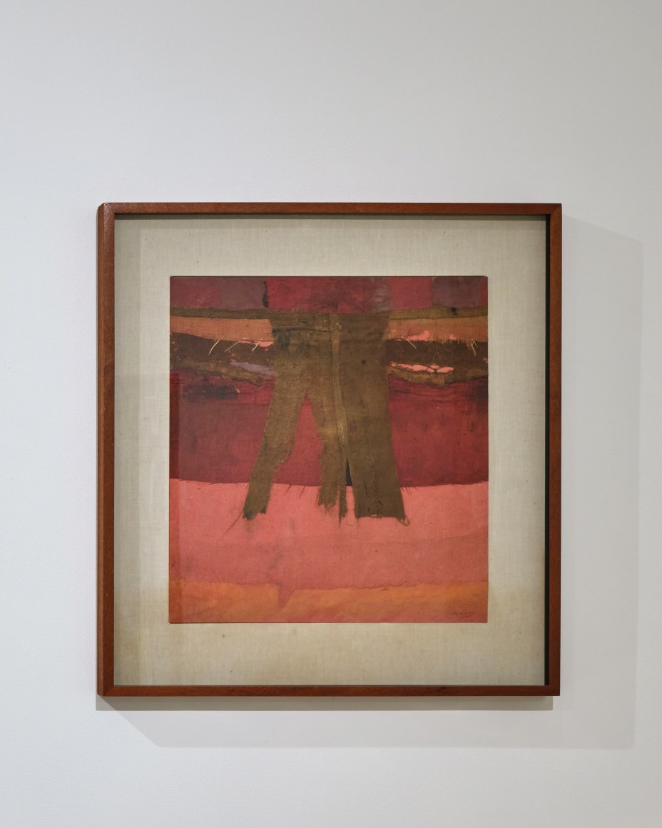 mixed media collage on a wall