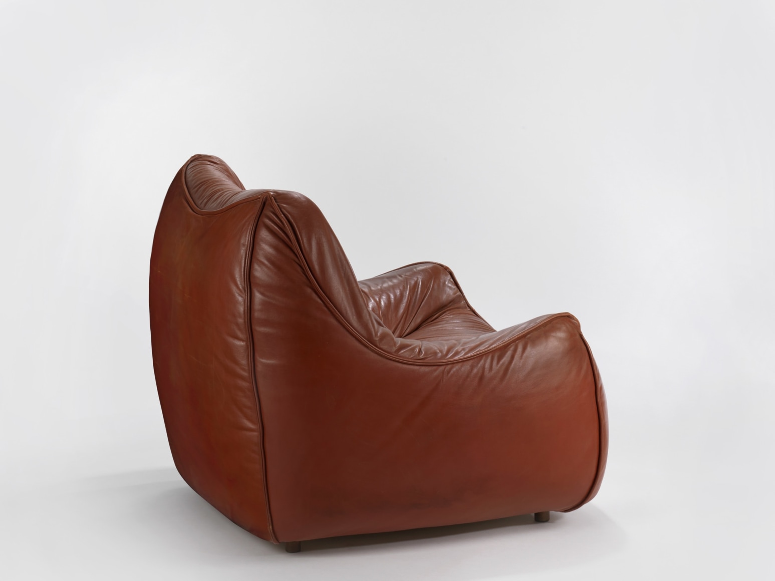 leather chair in an empty room