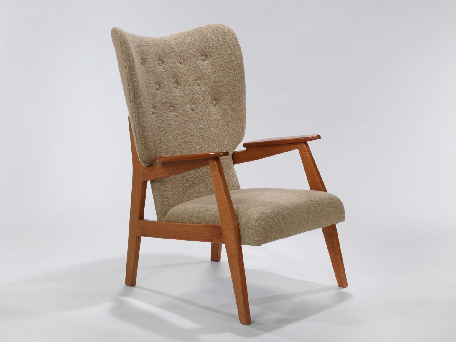 Cream upholstered chair with wood arms by Ren&eacute;-Jean Caillette