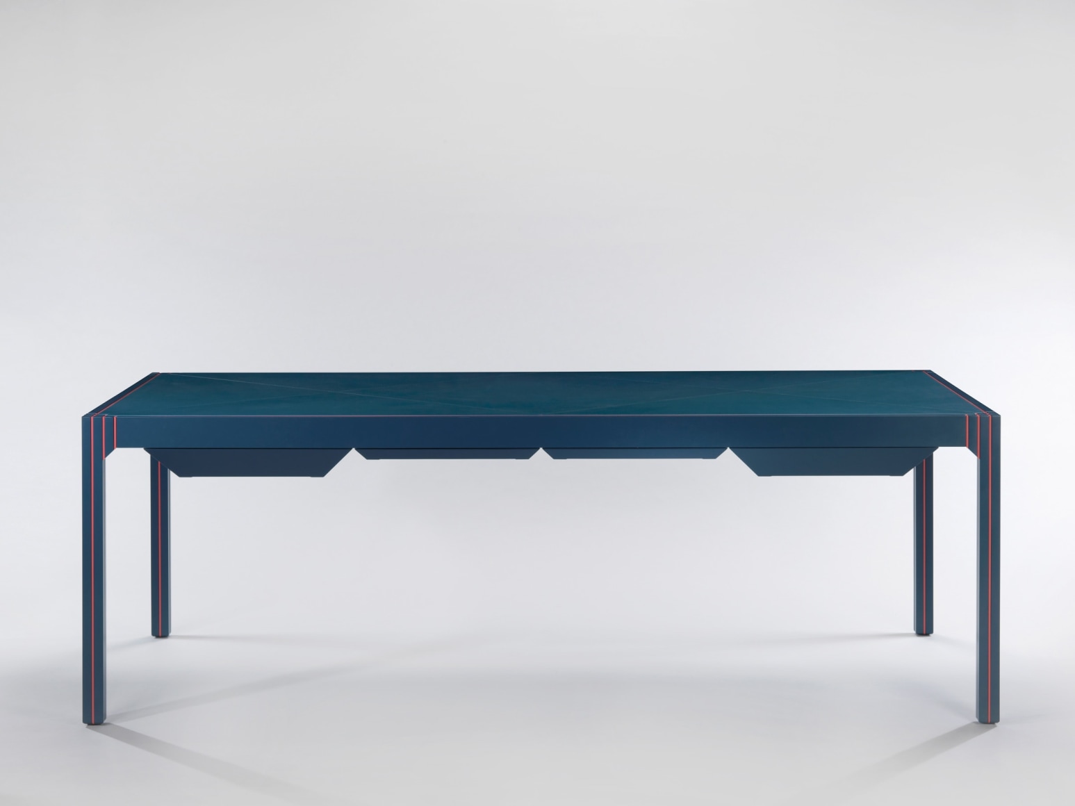 Blue lacquered desk with orange detailing by Pierre Paulin