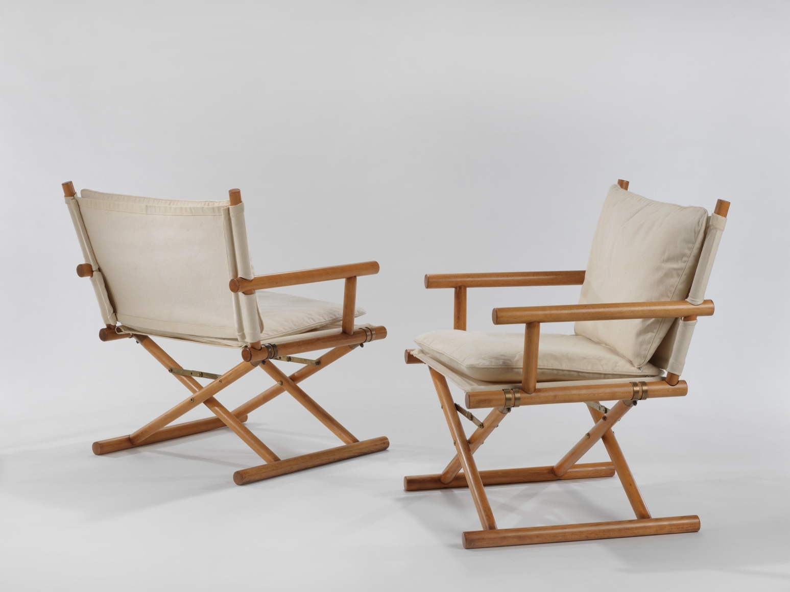 pair of chairs in a blank room