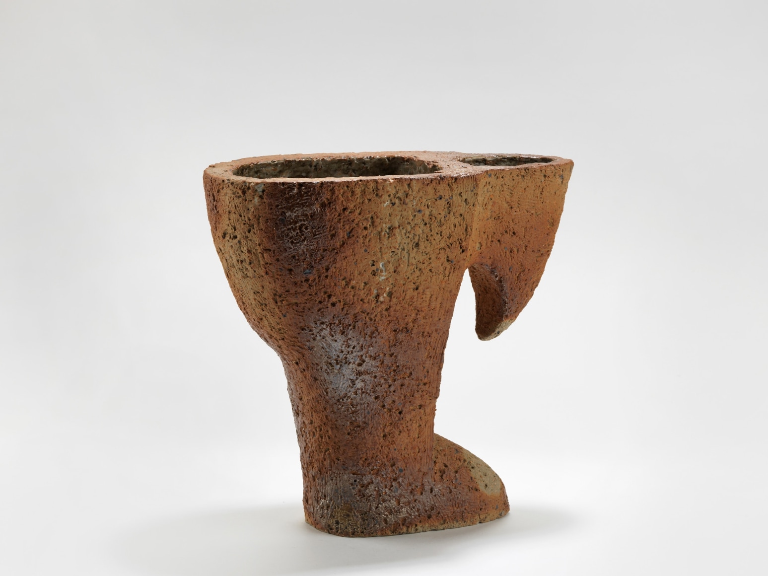 photograph of a ceramic dish in an empty room