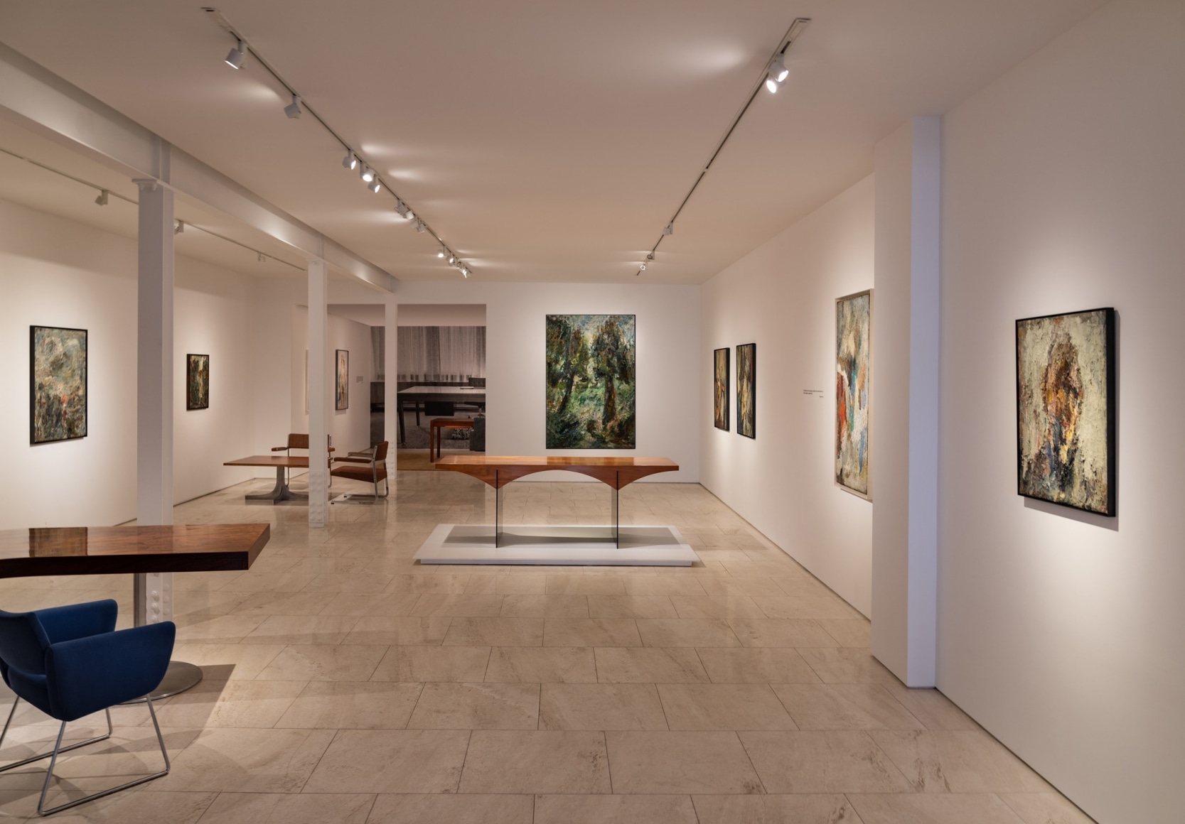 Installation view of the exhibition Dunkirk-Roubaix, Leroy works hang on exterior walls with Motte pieces on the floor of the gallery.