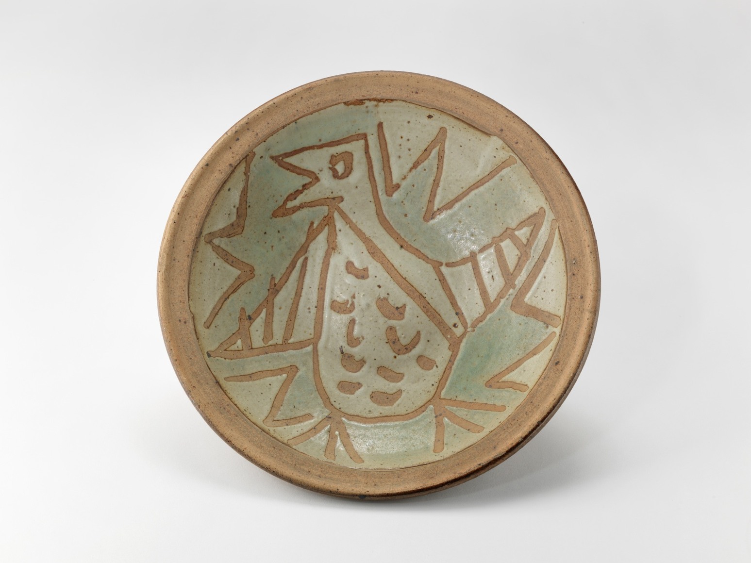 photograph of a dish in an empty room