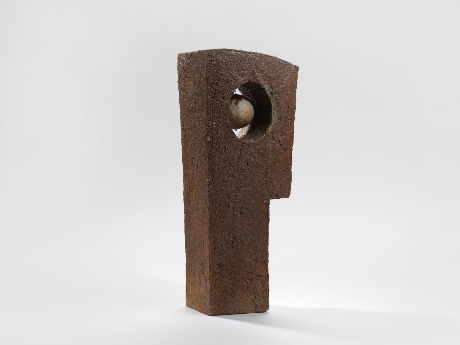 photograph of geometric sculpture in an empty room