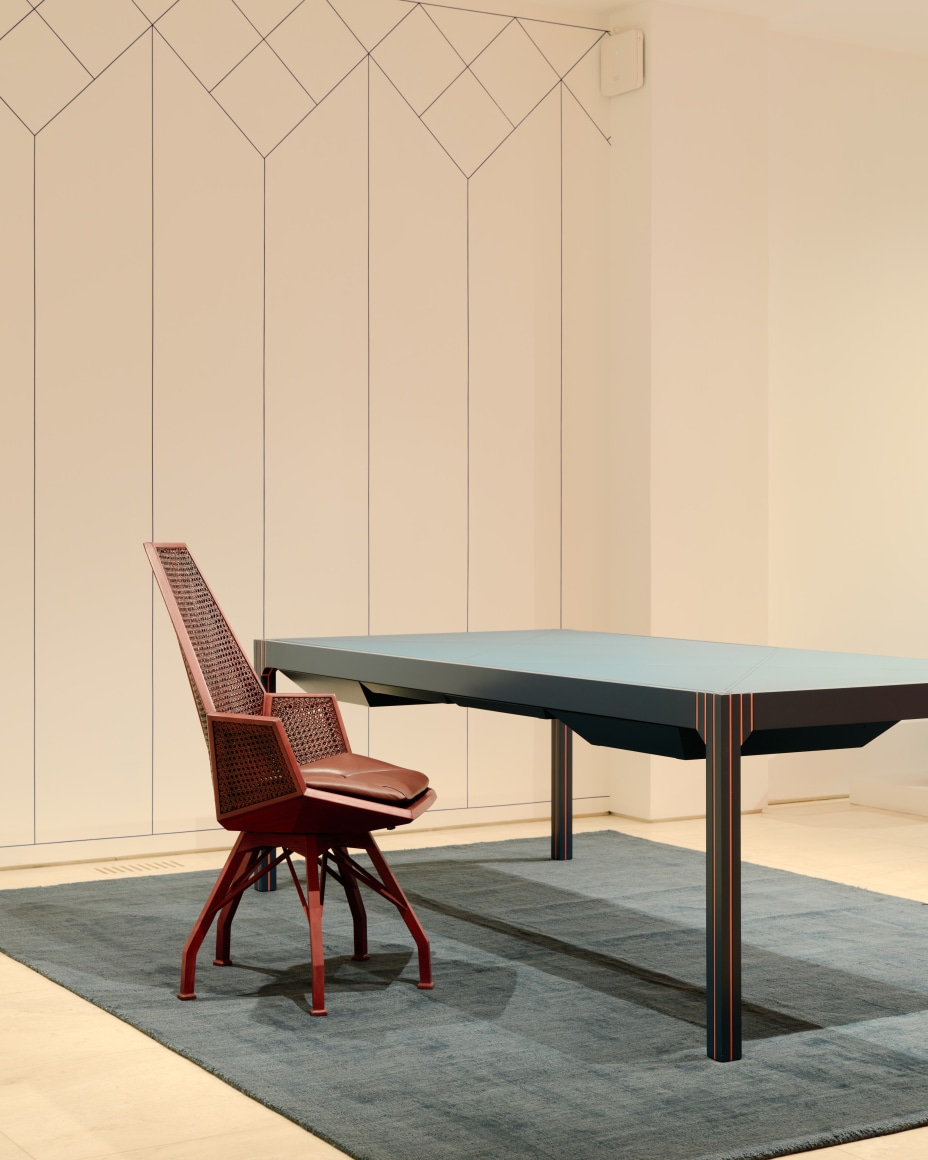 Installation view inside the gallery of works by Pierre Paulin. Multiple in the frame of shot. Many different colors such as blues and reds.