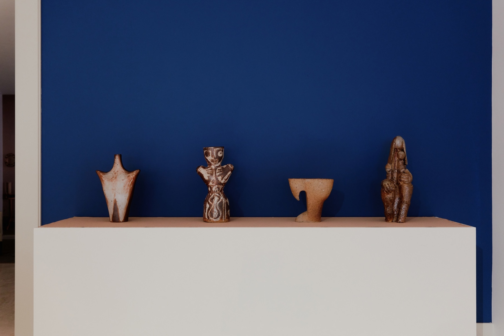 photo of ceramics in a room at a gallery