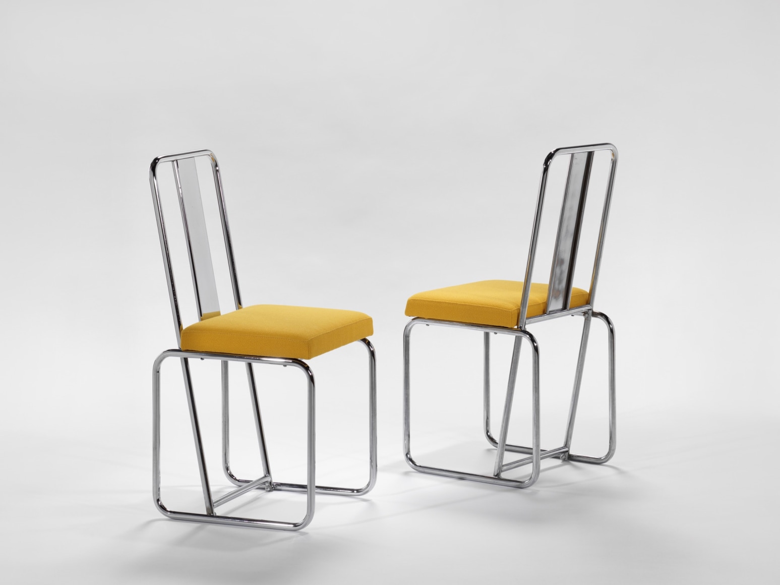 yellow chairs in an empty room