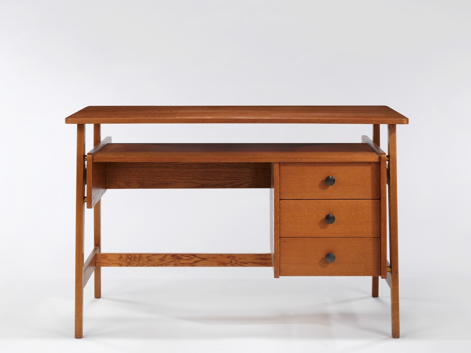 Image of desk in wood with drawers by Rene Jean Caillette.