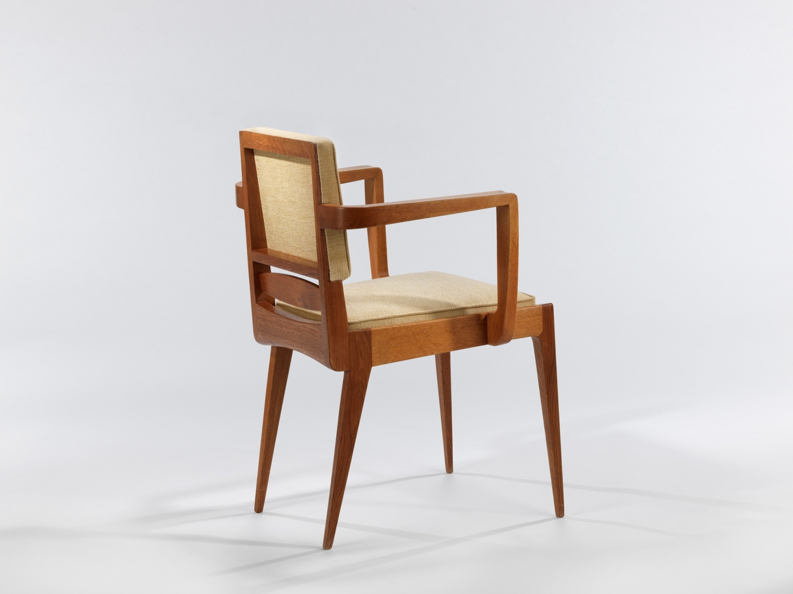 photograph of a chair in an empty room