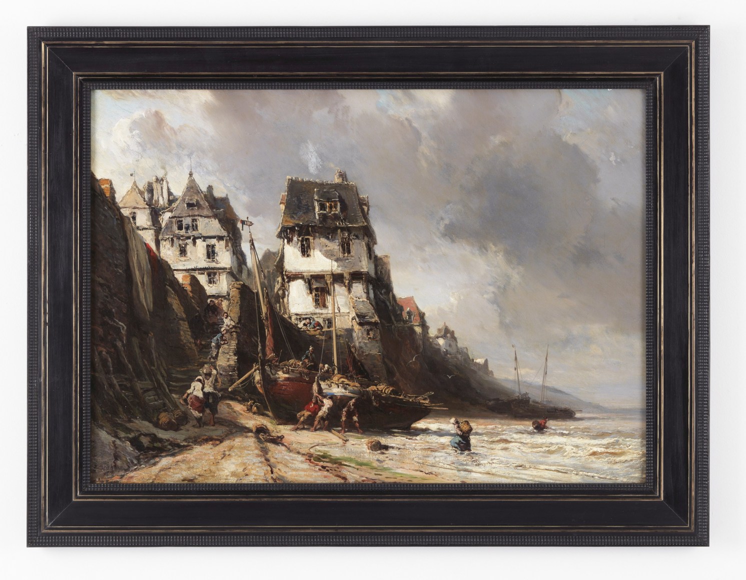 Framed oil painting of a returning fishing boat delivering goods to a seaside town