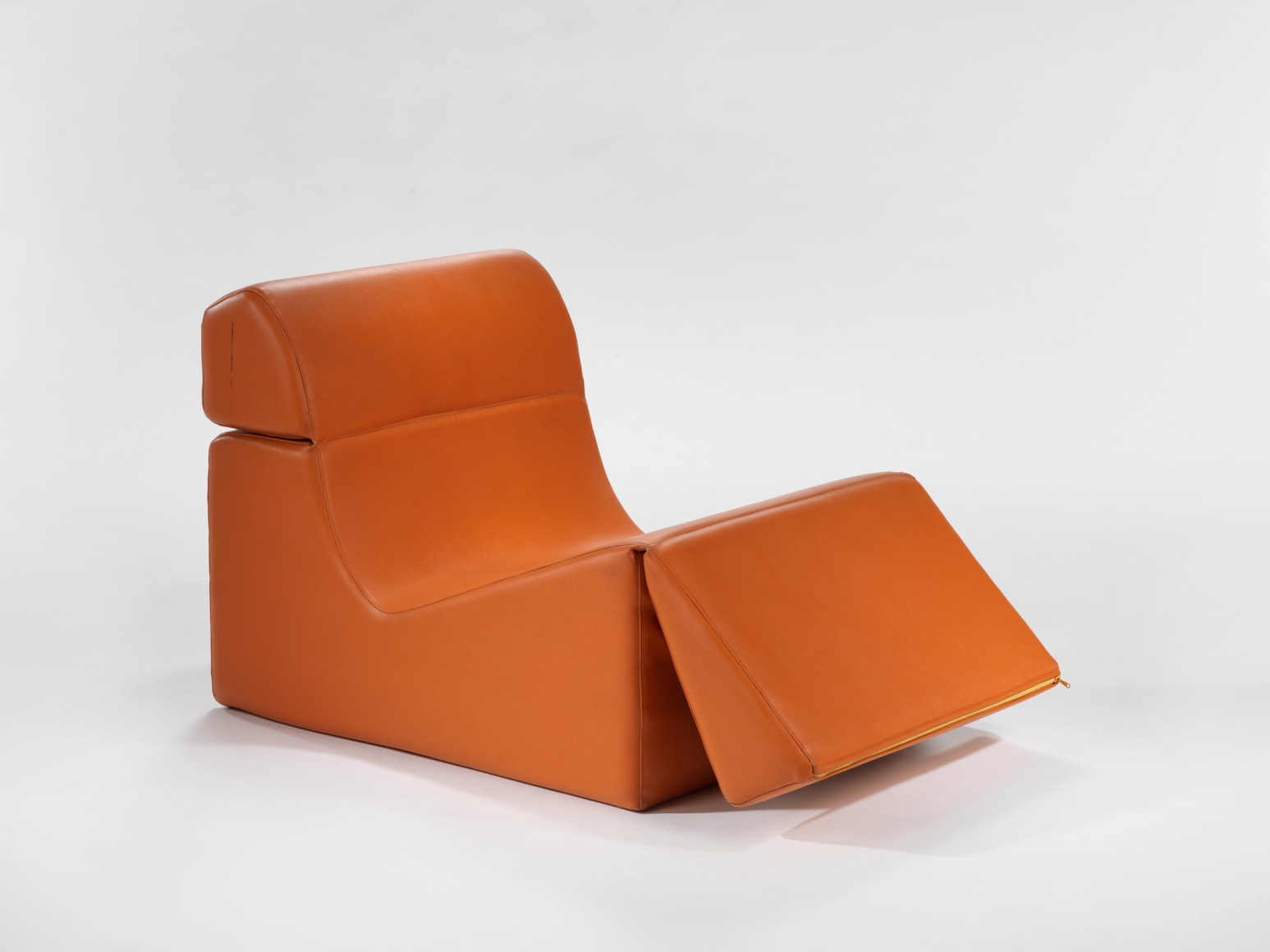 photograph in blank room with chair by Barray, chair is made from foam and vinyl