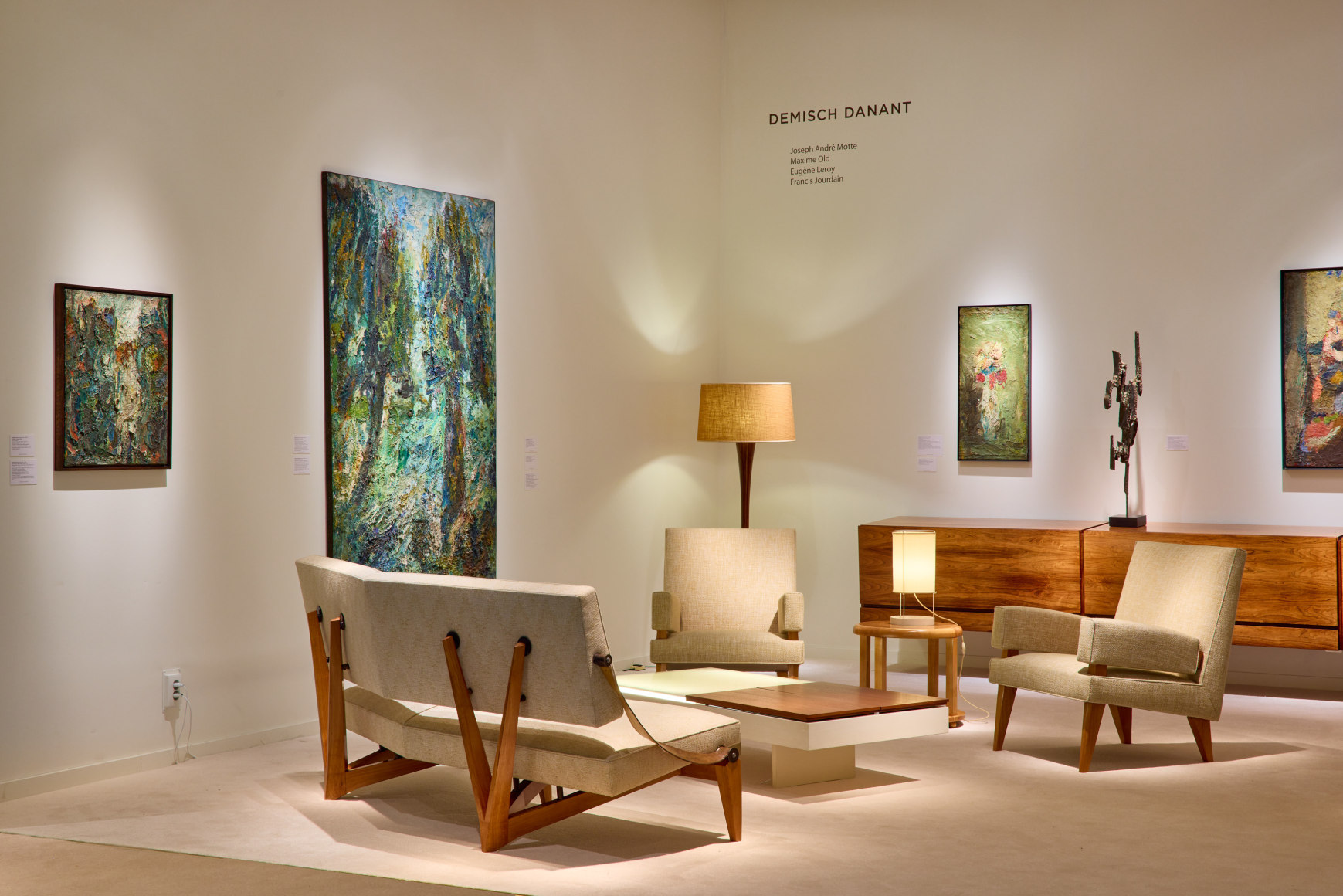 Booth view of Joseph-Andr&eacute; Motte furniture pieces and Eug&eacute;ne Leroy works at TEFAF Maastricht 2022