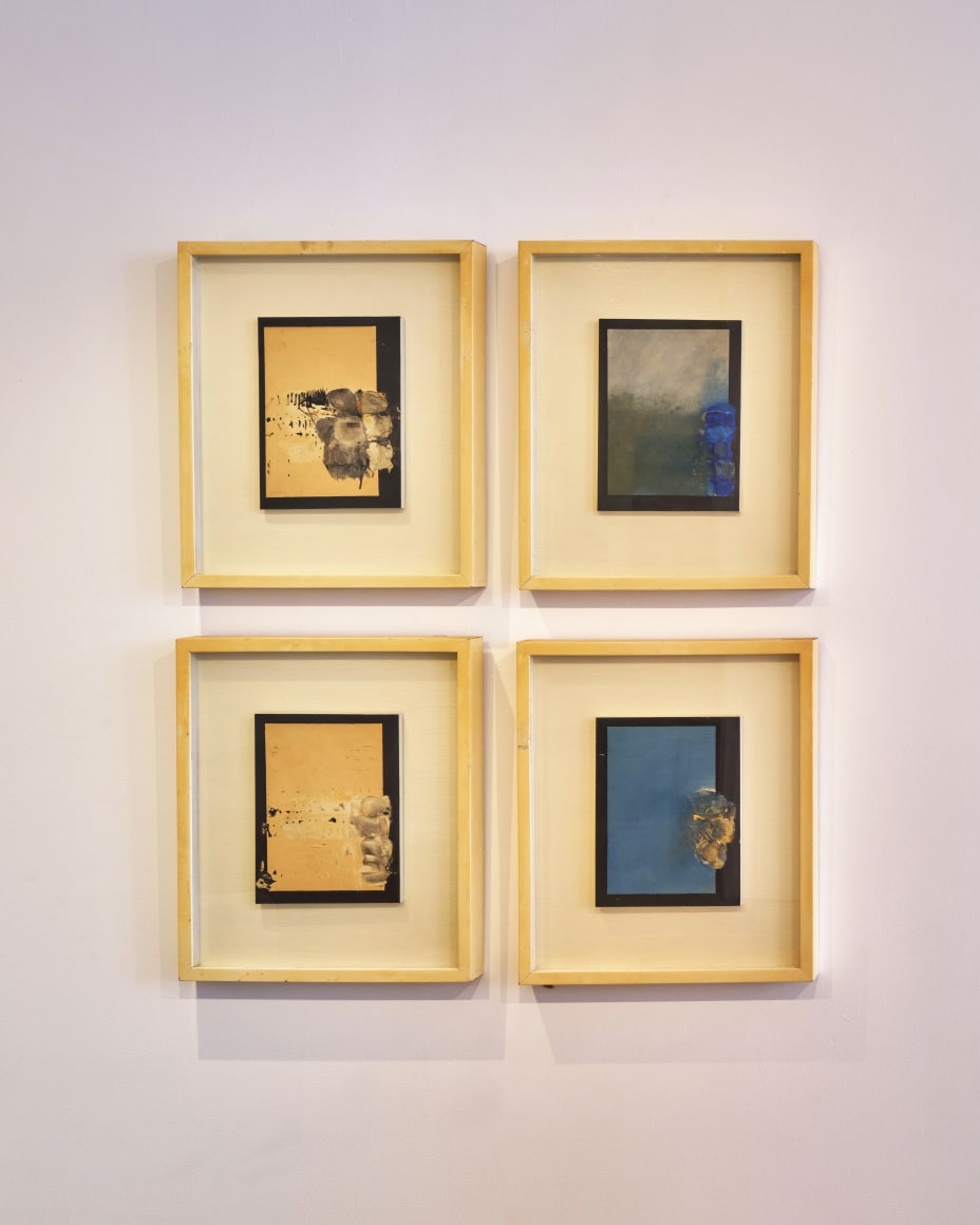 four artworks on a wall