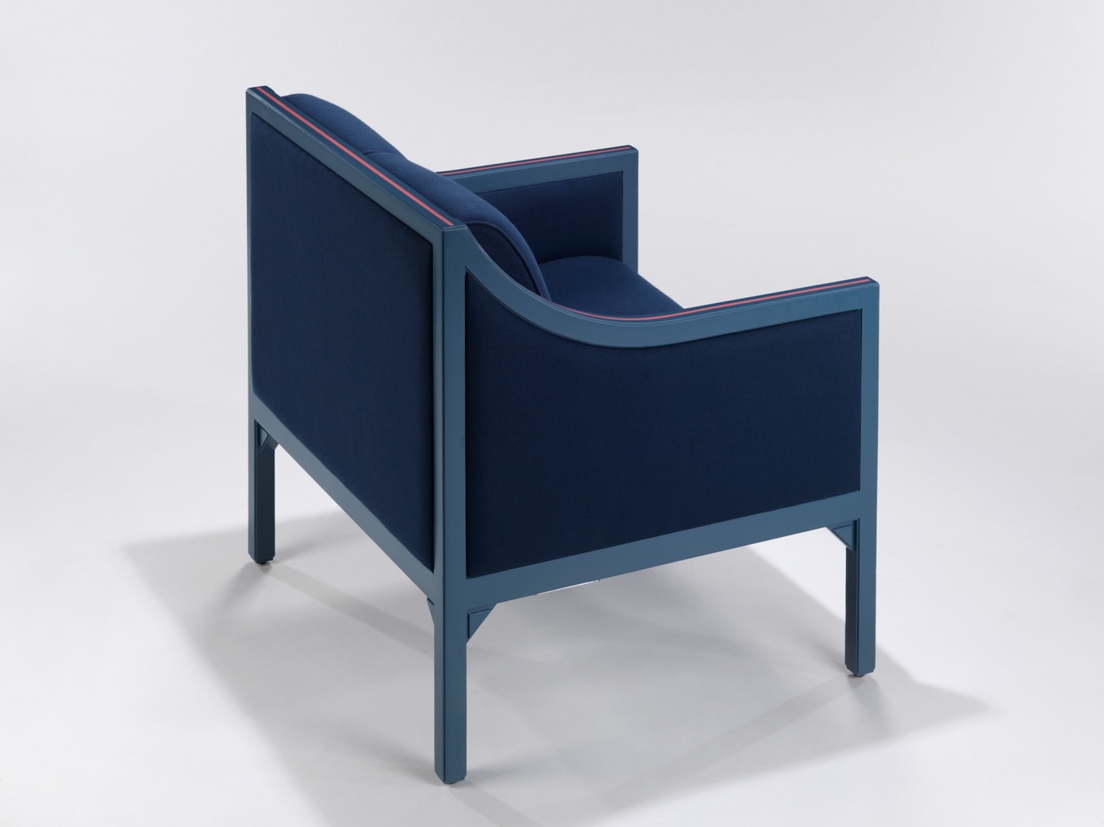 Back view of blue upholstered chair by Pierre Paulin