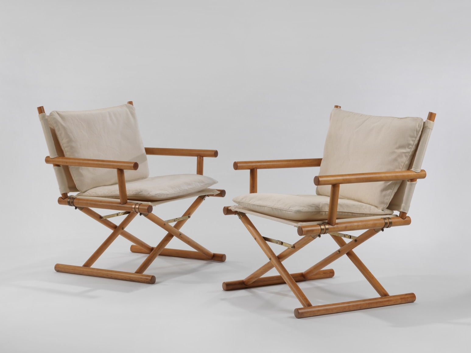 pair of chairs in a blank room