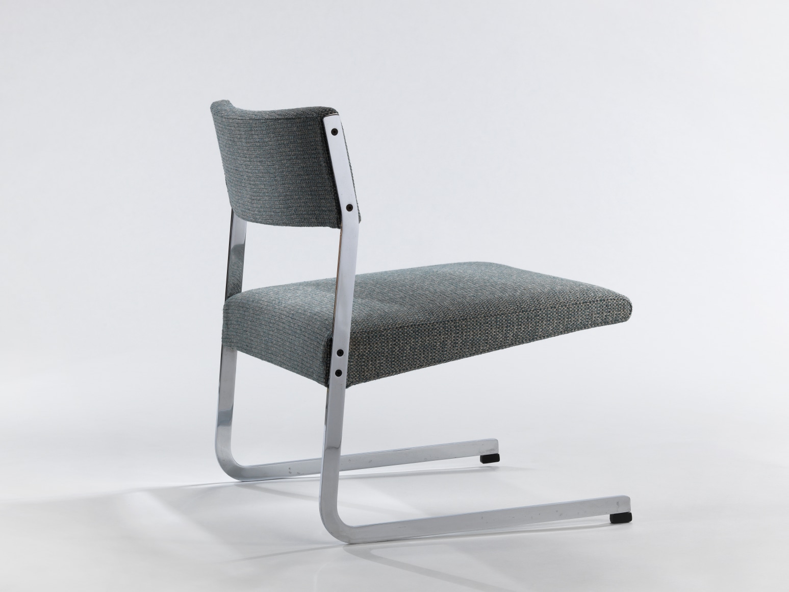 gray chair in a gray room