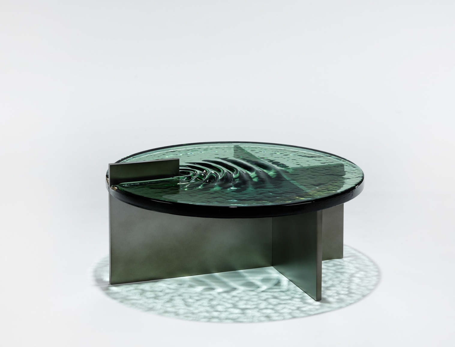 glass and aluminum tables that looks like water