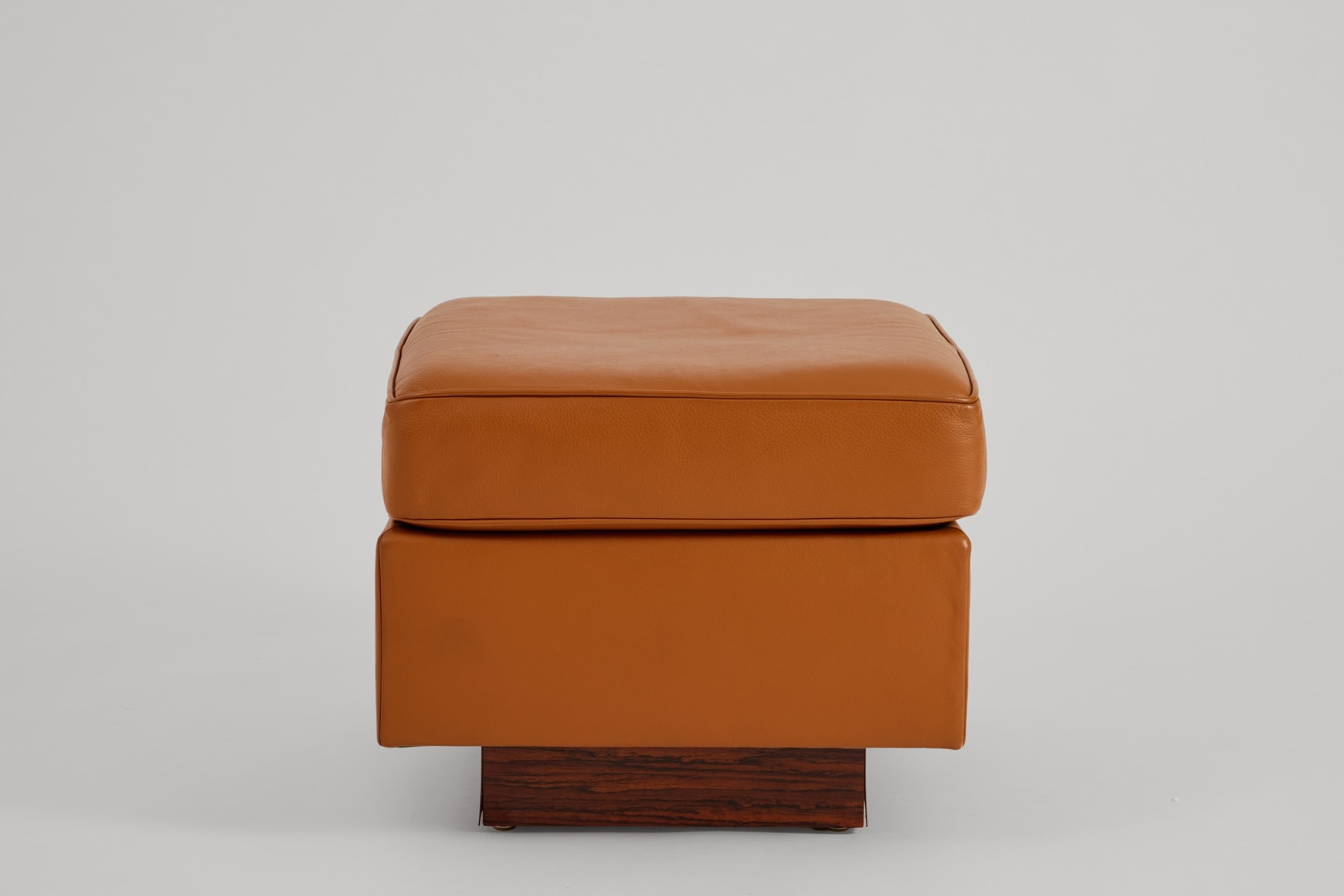 Motte pair of chairs in an empty room