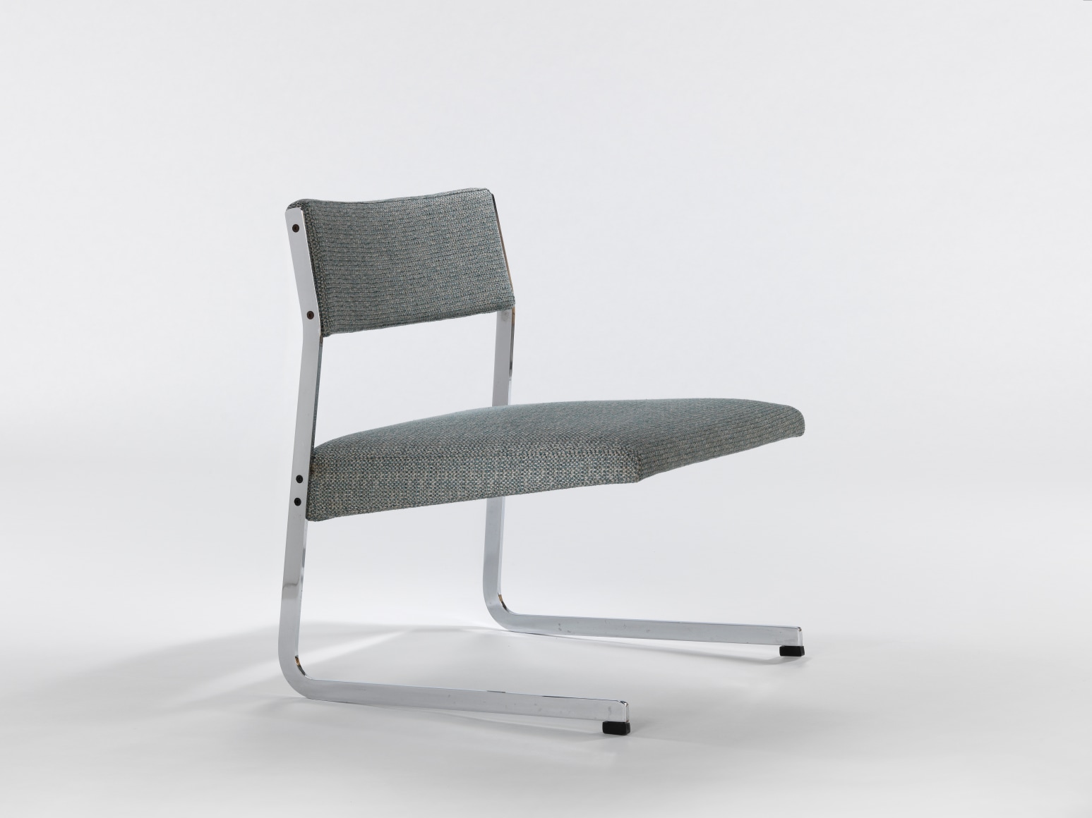 gray chair in a gray room