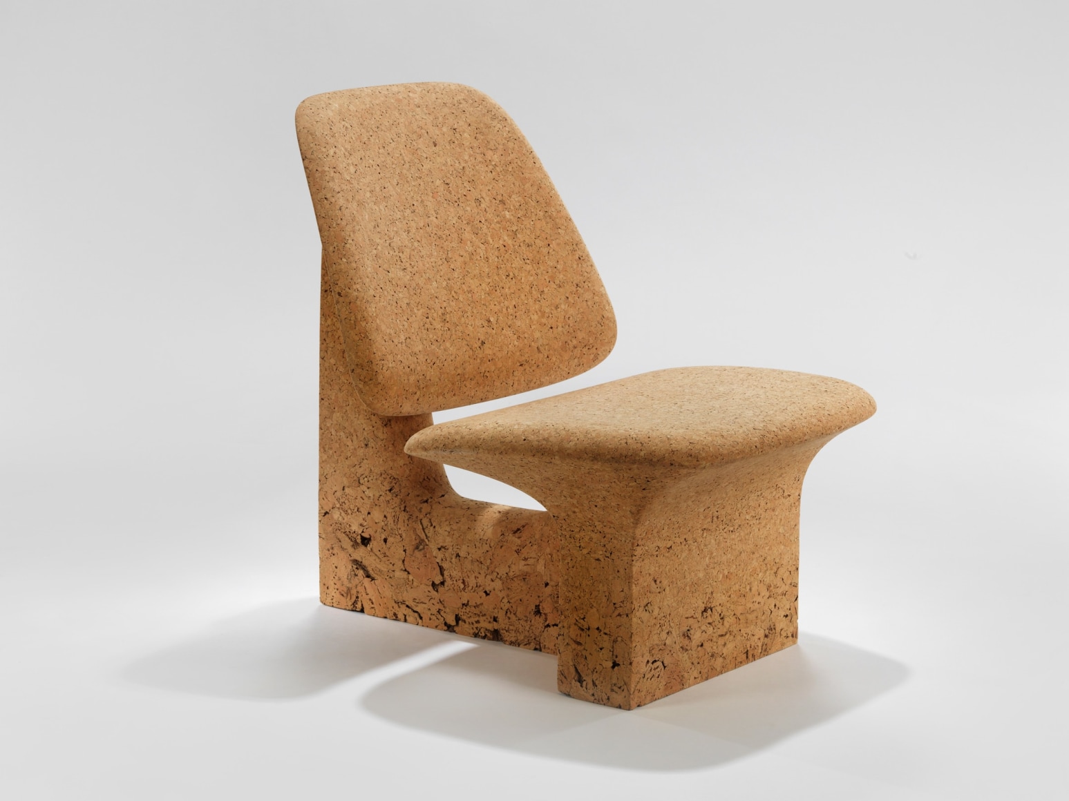 Burnt cork lounge chair in cork by made in situ.