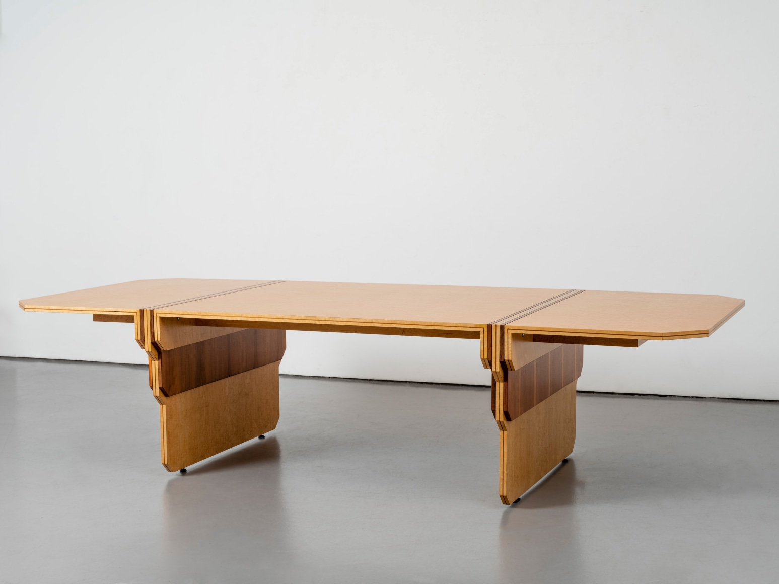 Maple and walnut wooden dining table by Pierre Paulin