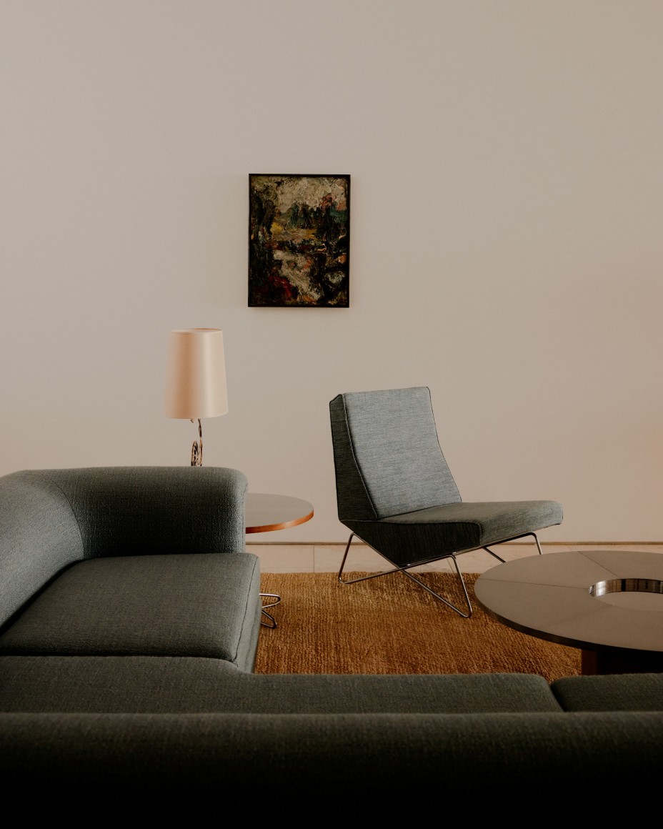 Gilbert Poillerat sofa, Genevi&egrave;ve Dangles and Christian Defrance's  low chair, and Maria Pergay's metal low table
