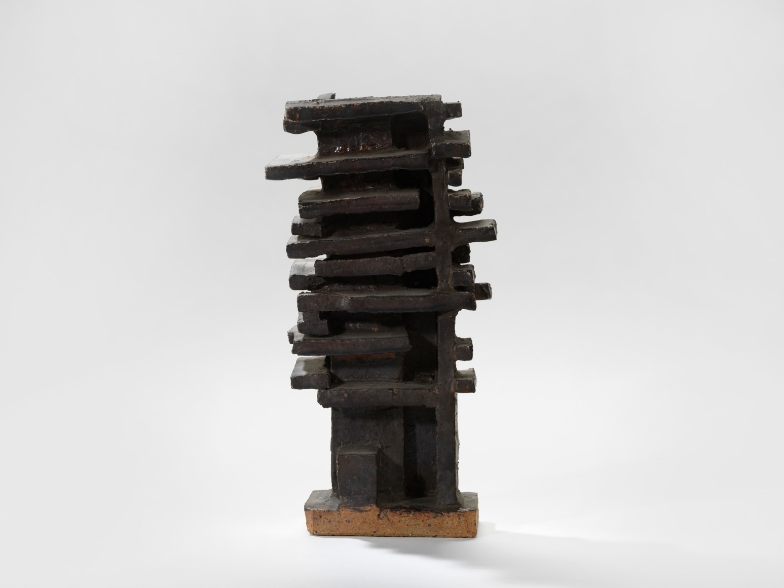 photograph of a geometric sculpture in an empty room