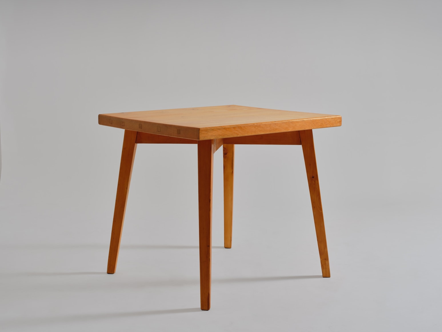 table in an empty room