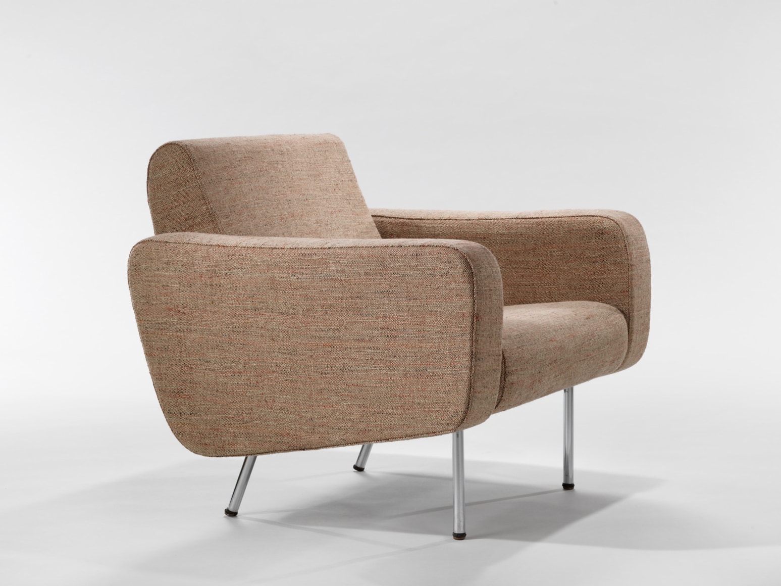 beige chair in a blank room