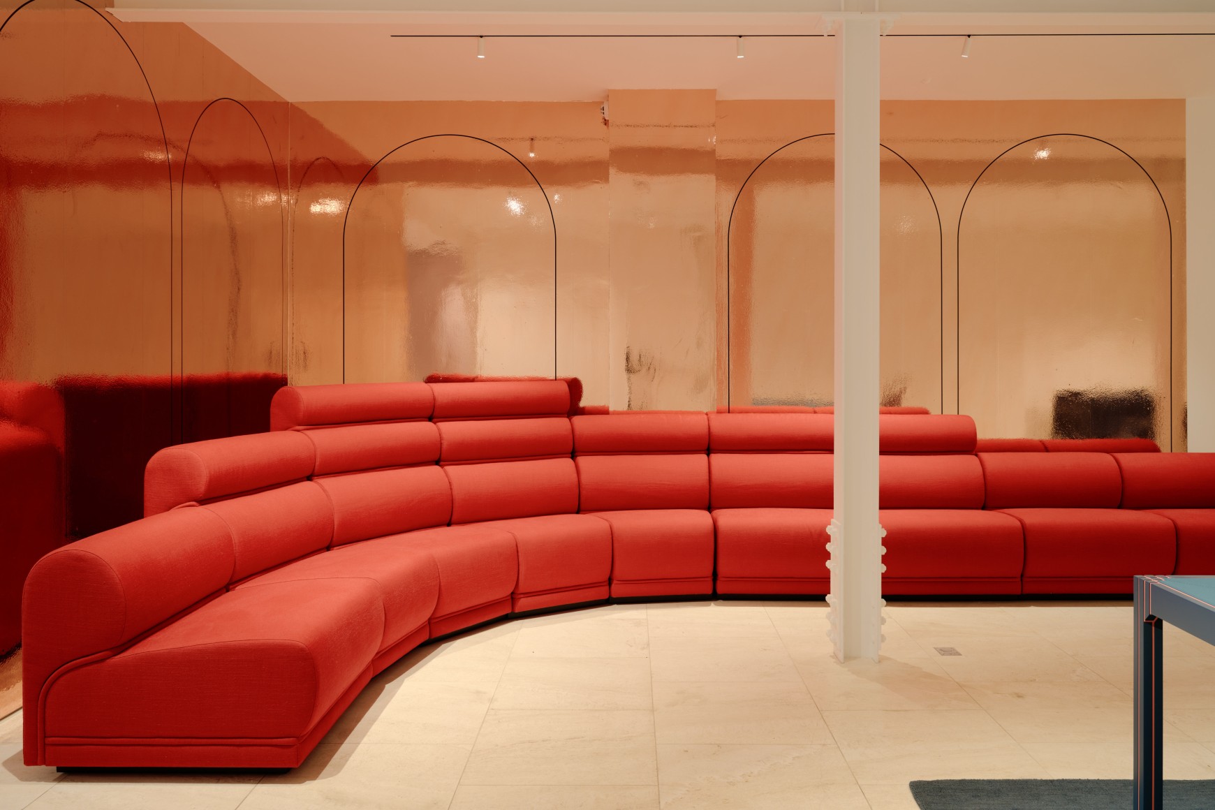 View of Paulin hotel de Ville sofa in the gallery. red upholstery in 10 sections.