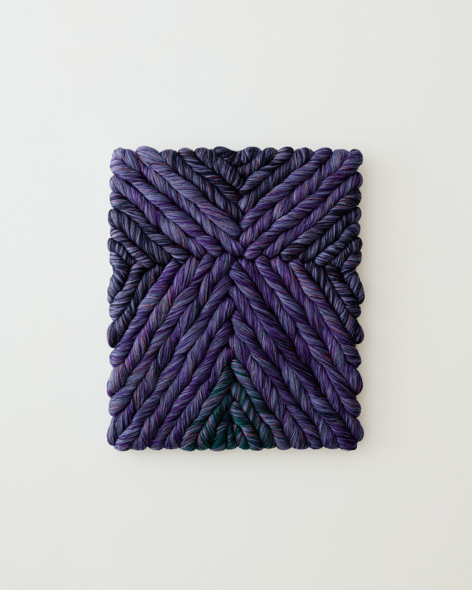 image of sheila hicks work in purples and blues braided into a chevron pattern.