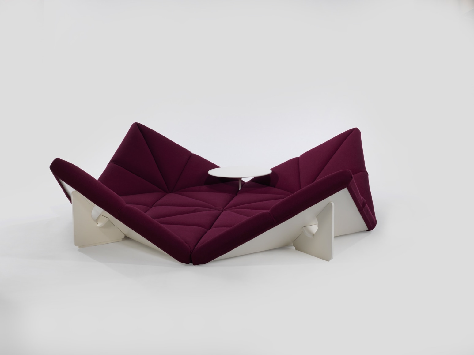 Upholstered modular sofa with table and without base by Pierre Paulin