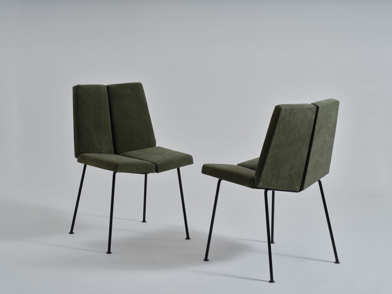 set of chairs in an empty room