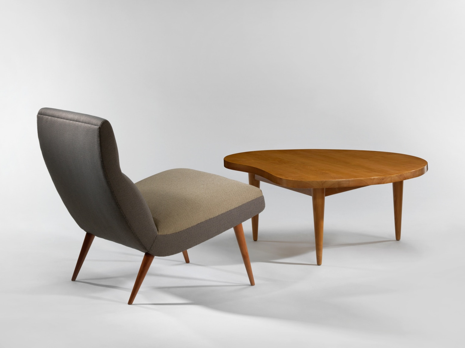 Shown with&nbsp;Low Chair&nbsp;(1954)&nbsp;