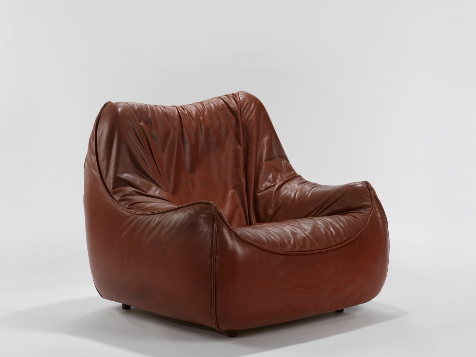 leather chair in an empty room