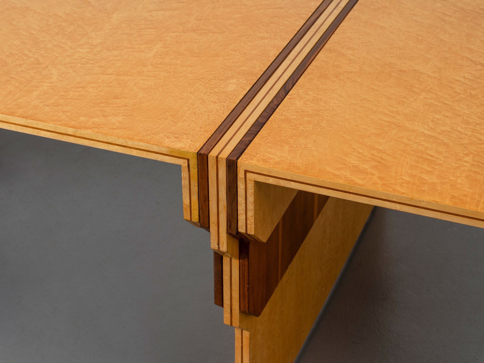 Joint detail of maple and walnut dining table by Pierre Paulin