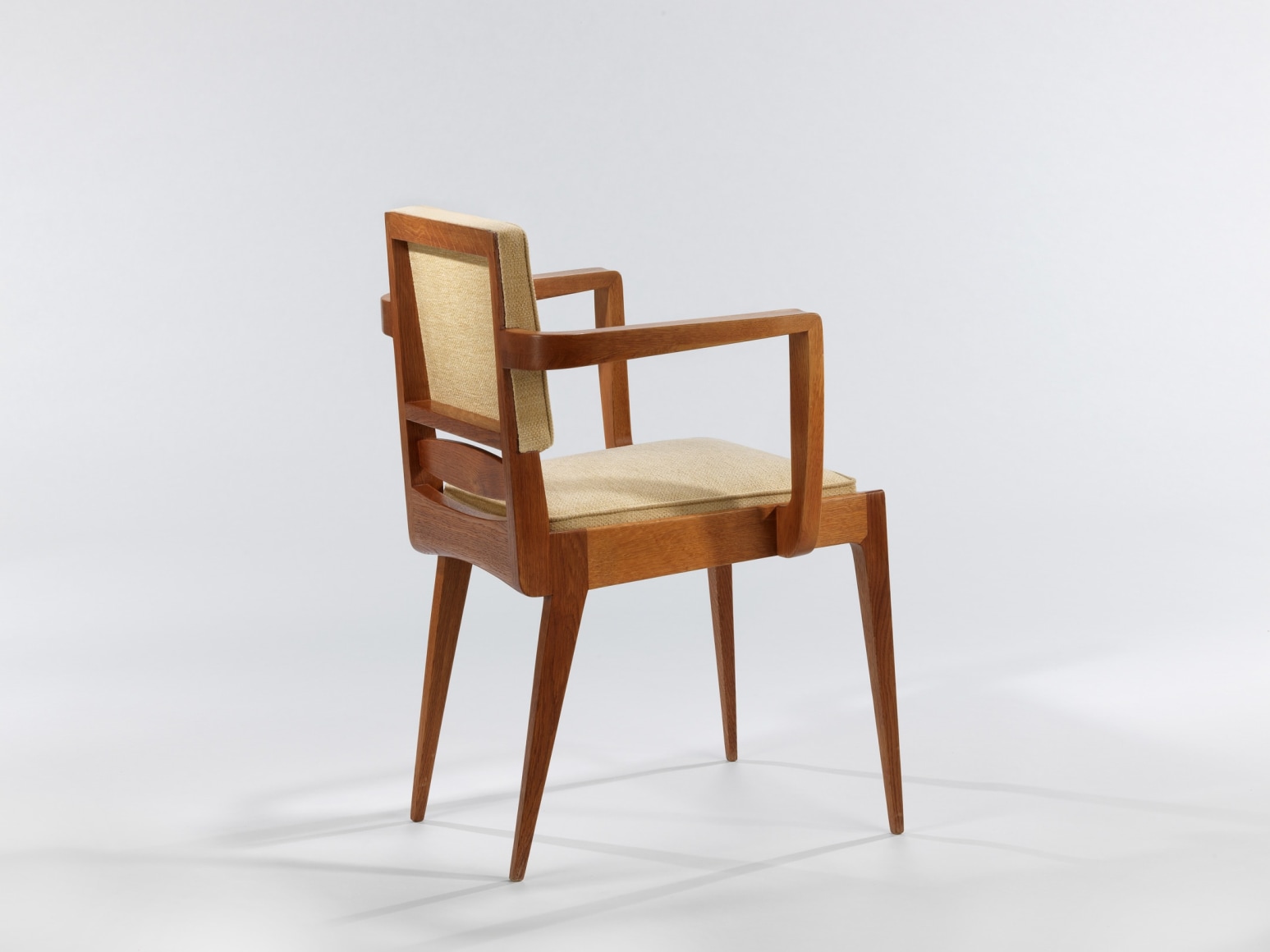photograph of a chair in an empty room