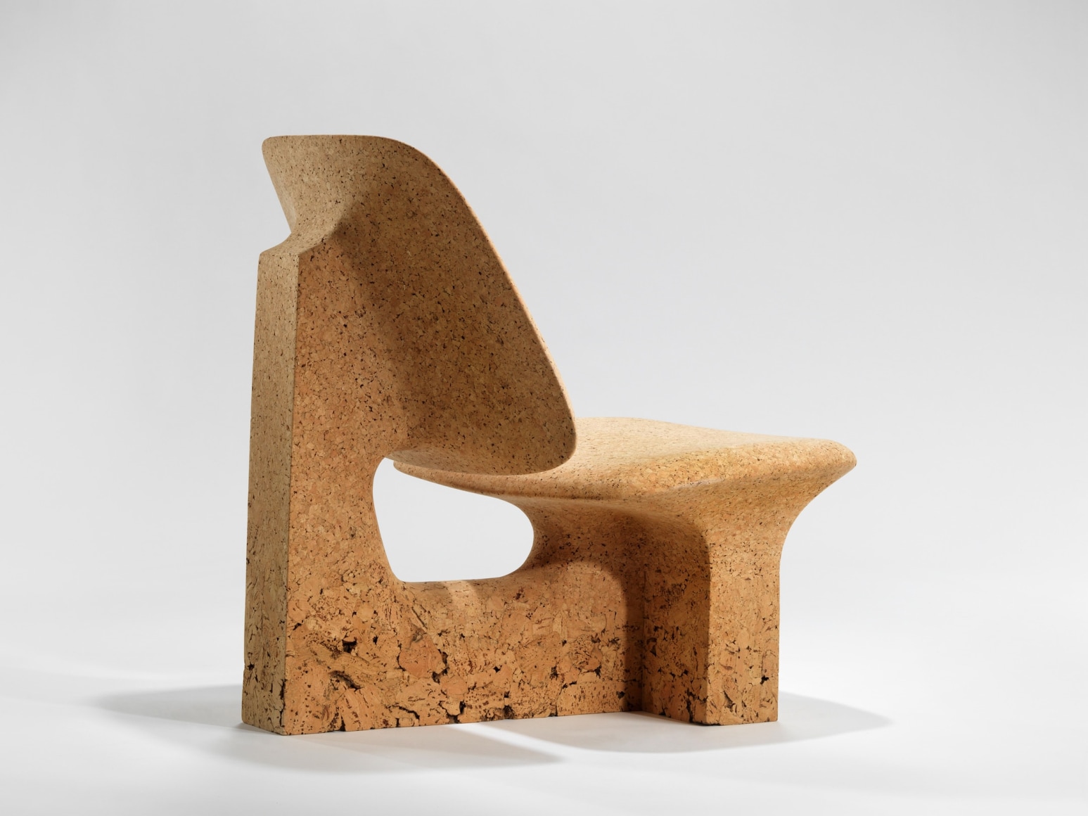 Burnt cork lounge chair in cork by made in situ.