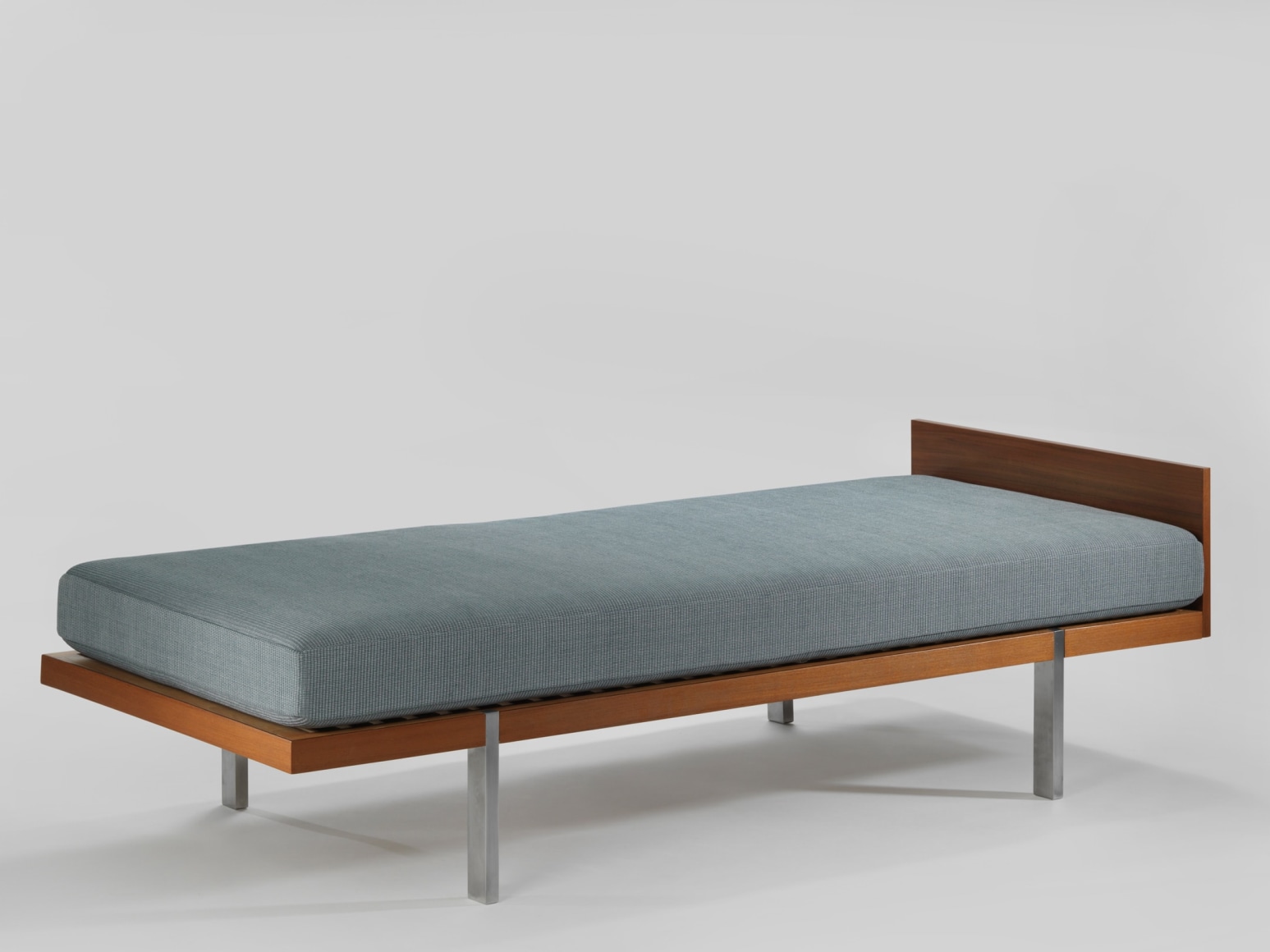 daybed in an empty room
