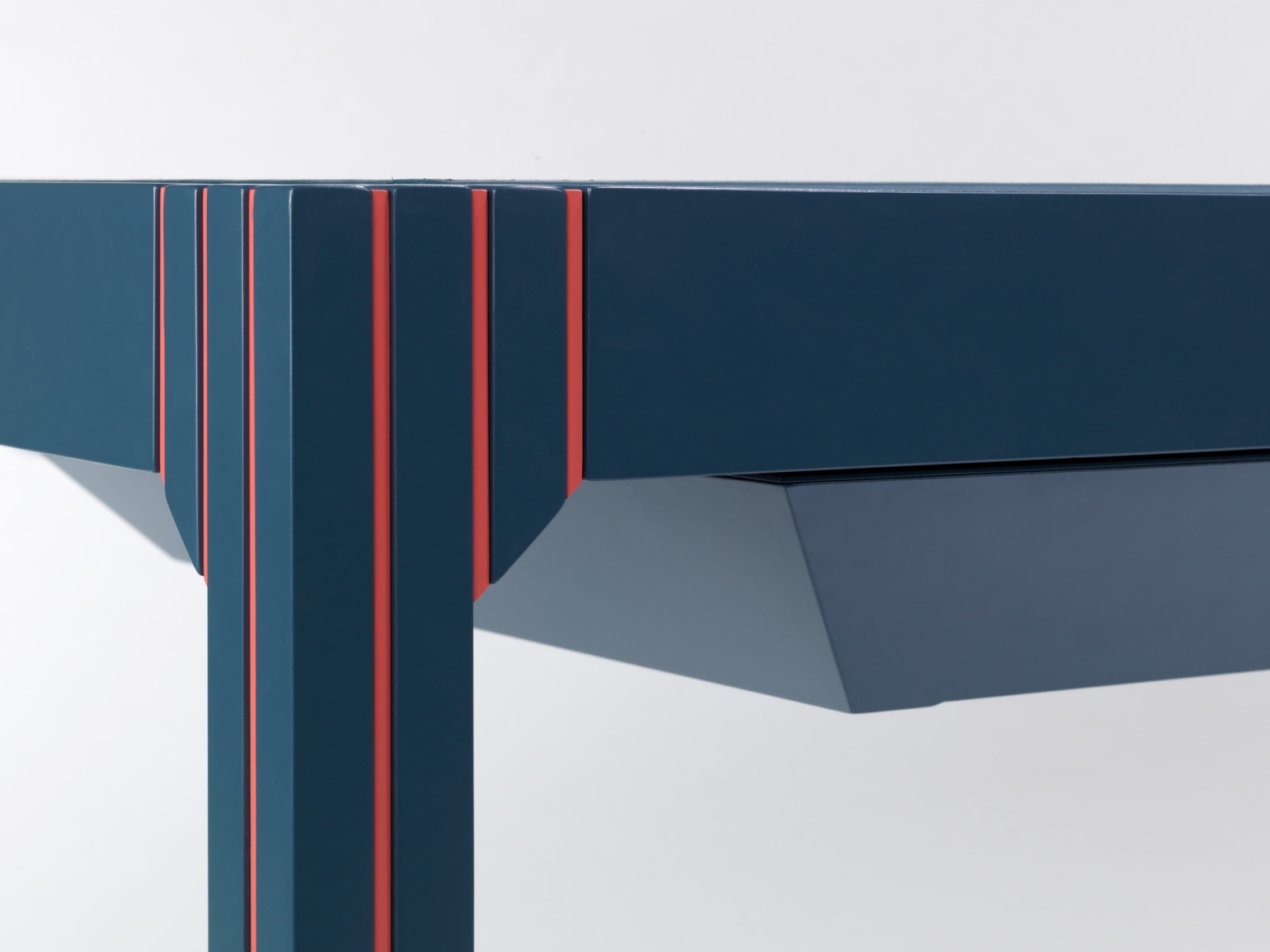 Detail of orange detailing on corner of desk